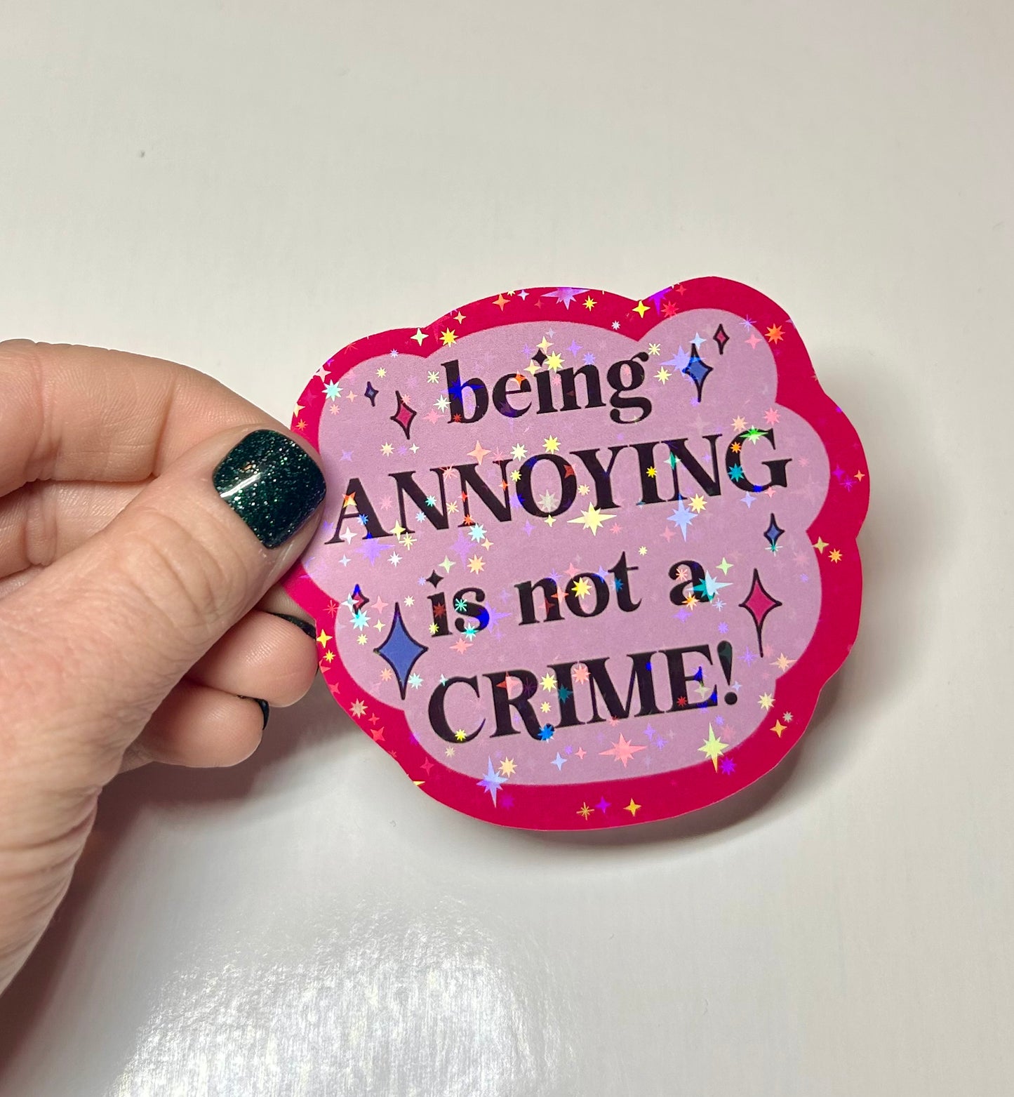 annoying is not a crime holographic sticker!